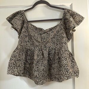 Cheetah print peplum top 🐆